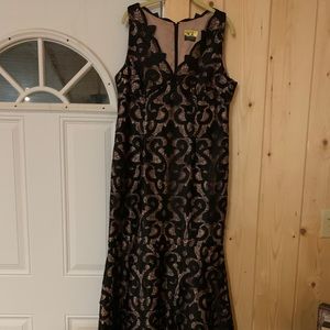 Classy black lace formal with nude underlay
